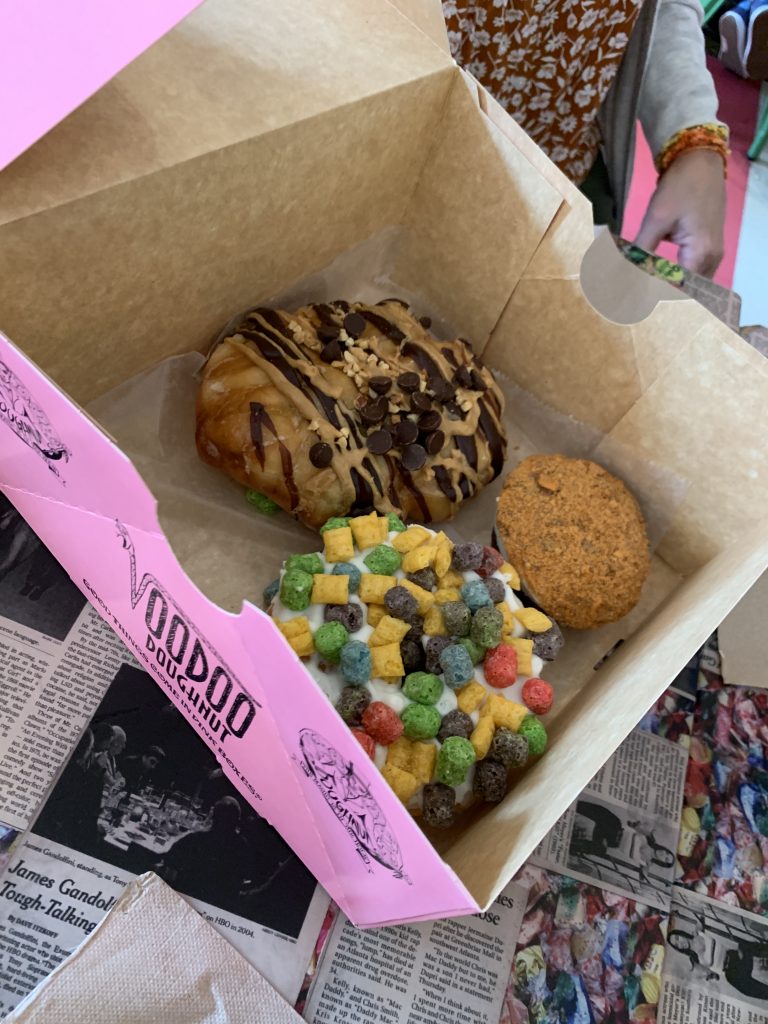 box of three donuts from voodoo donuts in austin texas